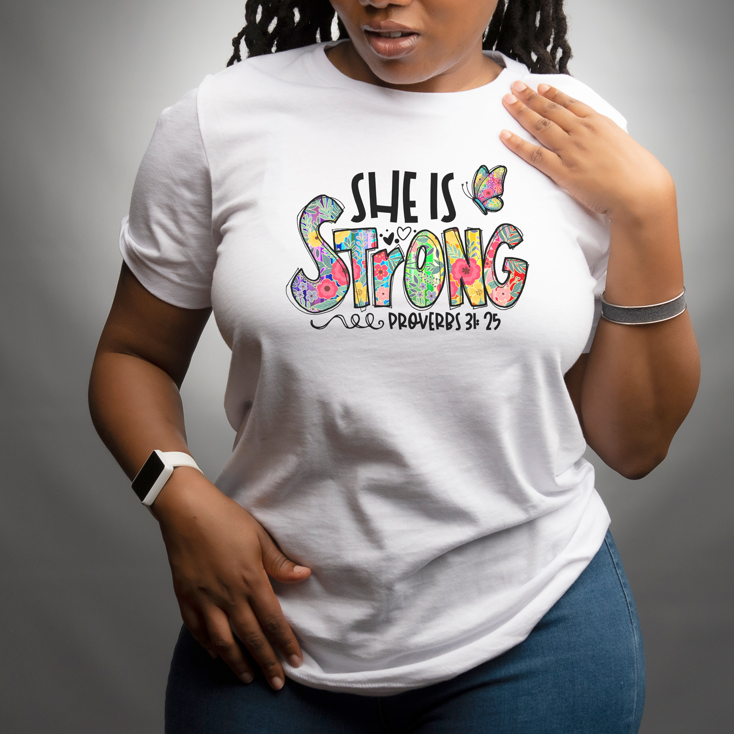 She Is Strong T-Shirt – Proverbs 31:25 Christian Floral Graphic Tee for Women