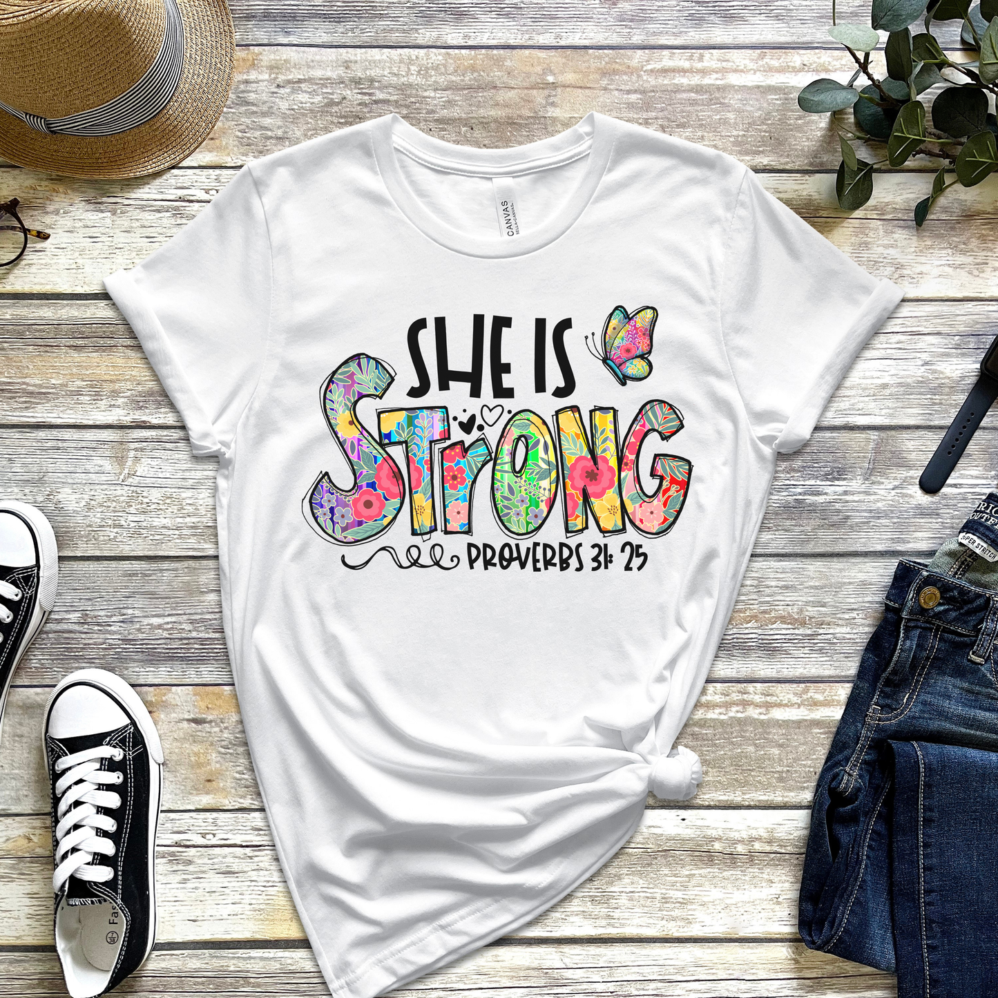 She Is Strong T-Shirt – Proverbs 31:25 Christian Floral Graphic Tee for Women